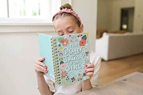 Prayer Journal for Teen Girls – Floral Faith Journal for Quiet Reflection Teen girl reading The Prayer Journal for Teen Girls with floral cover, seated at a table in a cozy, well-lit room