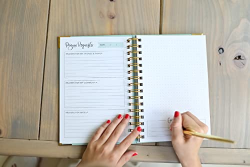 Prayer Journal for Teen Girls – Guided Prayer Request Layout for Faithful Reflection Teen girl writing in Prayer Journal for Teen Girls with gold pen, open to prayer request sections and dotted grid page on wooden table