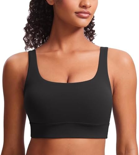 Butterluxe Sports Bra – Wire-Free Comfort & Sleek Support Model wearing Butterluxe Sports Bra in black, showcasing scoop neckline, wide straps, and seamless fit