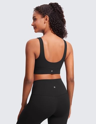 Butterluxe Sports Bra – Scoop Back Fit with Matching Leggings Back view of model wearing Butterluxe Sports Bra and high-waisted leggings in black, featuring scoop back design and logo details