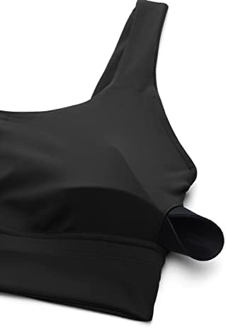 Butterluxe Sports Bra – Removable Padding Detail for Custom Fit Close-up of Butterluxe Sports Bra in black, showing removable padded insert partially pulled from inner lining