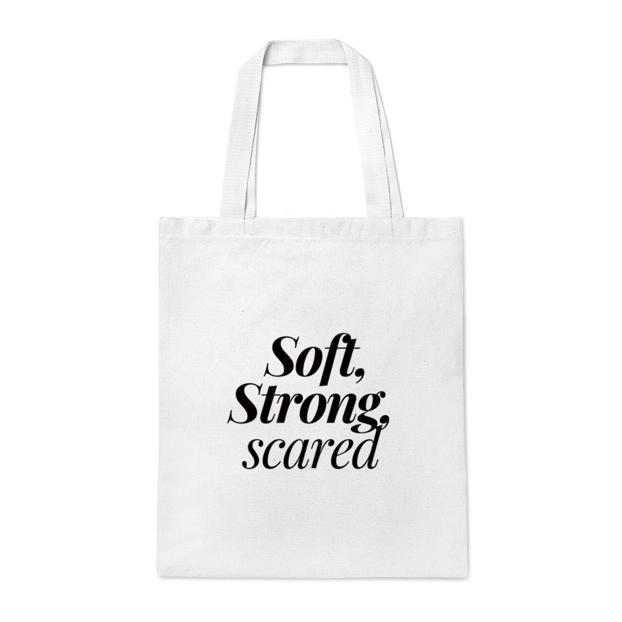 Canvas Tote Bag – Soft Strong Scared Emotional Statement White canvas tote bag with “Soft, Strong, scared” in mixed bold and italic fonts