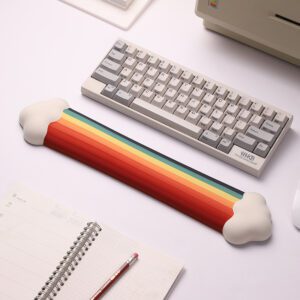 Long ergonomic cloud wrist rest with rainbow design and cloud-shaped ends