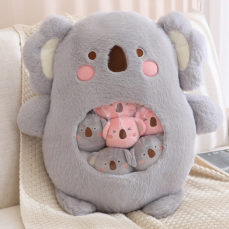 Plushie Collection Bag – Kozy Koala Edition Gray koala plushie collection bag with pink cheeks and transparent belly pocket filled with mini koalas.