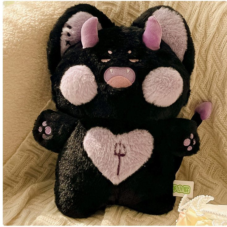 Angel Fox Plushie – Mischievous Midnight Edition Angel Fox Plushie in black with purple accents, horns, heart patch with trident symbol, and fierce expression.