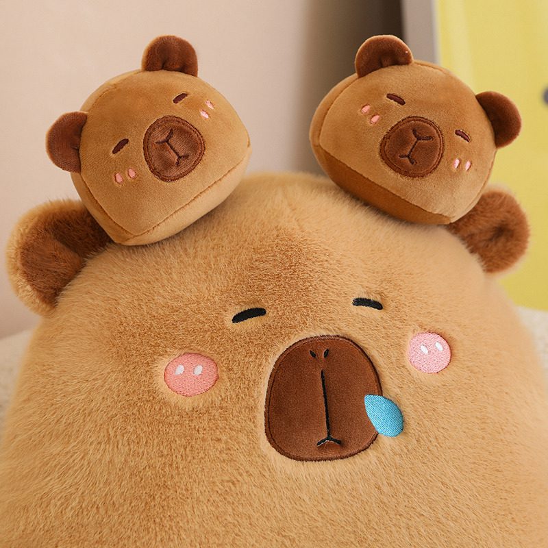 Capybara Plush Toy – Bear Stack Edition Capybara plush toy with two small bear plush heads stacked on top.